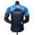 Camisa masculina azul da Williams Racing, modelo 23/24, vista traseira.