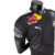 Camisa masculina da Red Bull para a temporada 23/24 de Fórmula 1, na cor preta, com detalhes de logos de patrocinadores.