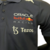 Camisa masculina azul da Red Bull Racing para a temporada 2023/2024 da Fórmula 1, com logotipos de patrocinadores.