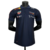 Camisa masculina azul da Red Bull Racing para a temporada 2023/2024 da Fórmula 1, com logotipos de patrocinadores.