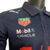 Camisa masculina azul da Red Bull Fórmula 1 23/24, com logos de patrocinadores.