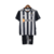 Kit infantil do Atlético Mineiro, modelo 23/24, nas cores preto e branco, composto por camisa e short.