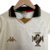 Camisa do Kit Infantil Vasco II Kappa 22/23 na cor branca, com detalhes em dourado e preto, destacando o escudo do clube e logotipo da Kappa.