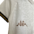 Kit infantil Vasco II Kappa 22/23 na cor branca com detalhes em dourado e preto, mostrando o design do tecido e logo da marca.