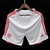 Shorts de futebol branco com detalhes em vermelho, marca Adidas, modelo Internacional Home 23/24.