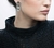 Brinco Trio Flores - loja online