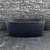 Banheira Freestanding Imersão Viena 150 preta de 1,5m em ambiente com parede de pedra.