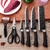Jogo De Facas Premium Inox Descascador E Tesoura 8 Peças Cabo Emborrachado Churrasco Presente Cozinha Geral - AconchegoOnline