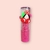 Balm labial da Lambranche com design de frutas, embalagem rosa com detalhes em vermelho e verde.