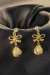 Brinco de Pérola Trabalhada com Zircônia e Laço Banhado em Ouro 18k - loja online