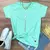 Camiseta Feminina Verde Menta Cruz Prata Jesus Cristo