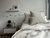 Set de manta y cojín para cuidar la cama de nuestros niñ@s cuadrille beige en internet