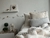Set de manta y cojín para cuidar la cama de nuestros niñ@s cuadrille gris en internet
