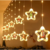 Cascata com 130 LEDs Branco Quente fio de fada PVC estrela + figuras natalinas 3 metros bivolt. - comprar online