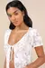 Top de Malha Texturizada Floral com Manga Curta e Gravata