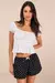 Mini Shorts Preto de Bolinhas com Laço