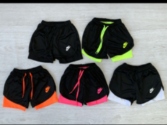 Shorts calza Nike Dama