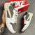 Tênis Jordan 1 Low Cactus Jack Branco e Bege