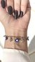 Pulseira de pontos de luz e olho grego