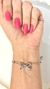 Pulseira de bolinhas e laço