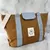 BOLSO LISO CON AZA RÍGIDA BASILEA