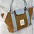 BOLSO LISO CON AZA RÍGIDA BASILEA - comprar online