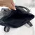 BOLSO JHON C/TACHAS en internet