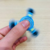 BORRACHA ESCOLAR DE APAGAR COM HAND SPINNER ASTRONAUTA AZUL