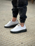 Mcqueen Air blanca base negra - comprar online