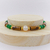 Pulseira jade verde e olho de tigre banhada a ouro 18K