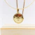 Colar fita com pingente Espírito Santo banhado a ouro 18K