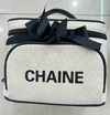Porta comestico CHAINE con Mono