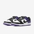 Tênis Nike Dunk Low "Court Purple" em roxo, preto e branco, com design moderno e solado roxo.