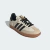 Tênis Adidas Samba na cor creme com detalhes em preto e sola marrom