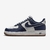 Tênis Nike Air Force 1 "College Pack" na cor azul, com detalhes em branco e sola de borracha disponível na Supernova Sneakers