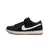 Tênis Nike SB Dunk Low "ISO Black Gum" na cor preta com detalhes em branco e sola de borracha.