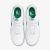 Tênis Nike Air Force 1 "Malachite" na cor branca com detalhes em verde disponível na Supernova Sneakers