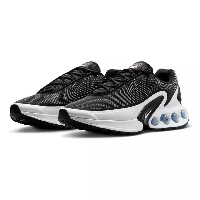 Imagem do Tênis Nike Air Max Dn "Black White" nas cores preto e branco, exibindo detalhes da parte superior e da sola com amortecimento, disponível na Supernova Sneakers.