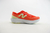 Tênis de corrida New Balance FuelCell SuperComp Elite V4 na cor laranja, com detalhes em branco e solado robusto, disponível na Supernova Sneakers.