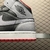 Air Jordan 1 Mid GS Black Cement Grey Fire Red na internet