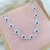 Choker Olho Grego Fundo Branco Prata