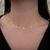 Choker Cruzinhas com Zirconias Ouro