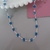 Choker Olho Grego Azul Claro Prata