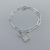 Pulseira Trevo Pérola com Coração Cristal Prata