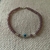 Pulsera cristales lila y ojo turco nacar