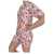 Pijama infantil feminino com estampa de girafas e bolinhas rosas, composto por camiseta e shorts, tamanho 10 ao 14.