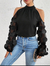 Blusa negra con mangas con apliques XL