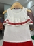 conjunto MOMI blusa bege com detalhes bordados em vermelho e shorts vermelho - comprar online