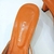 Zapatos rosa y naranja