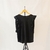 Musculosa negra calada
